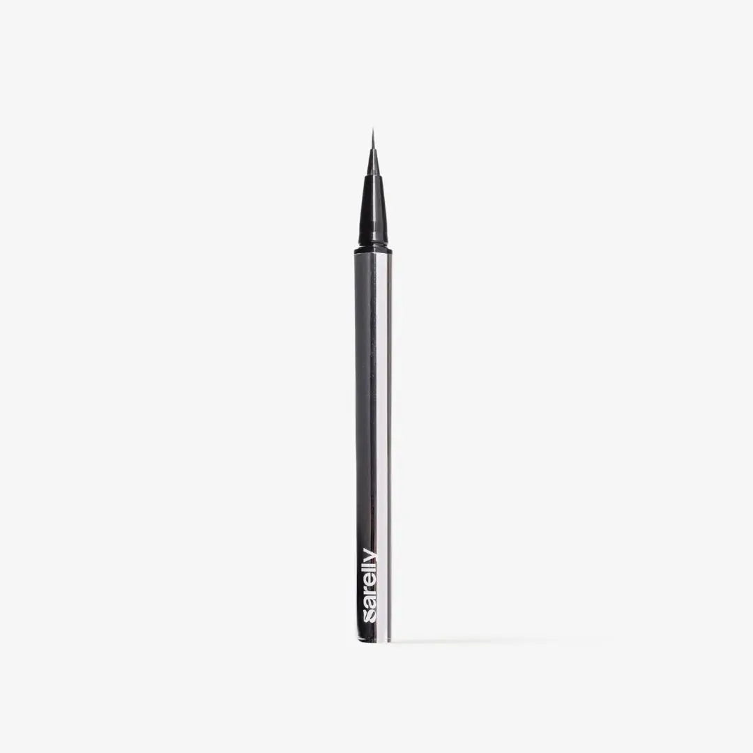 A slim black and silver cosmetic pen with a fine tip, standing vertically on a light gray background. The brand name sarelly is printed in white near the bottom of the pen barrel.