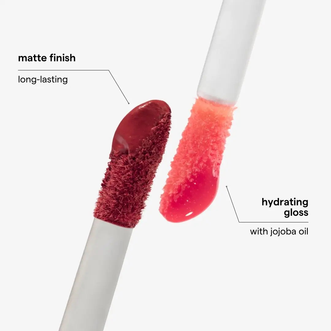 Two doe-foot applicators showing lip gloss textures on a light gray background, with text labels reading 'matte finish long-lasting' and 'hydrating gloss with jojoba oil'. Shade Rubi