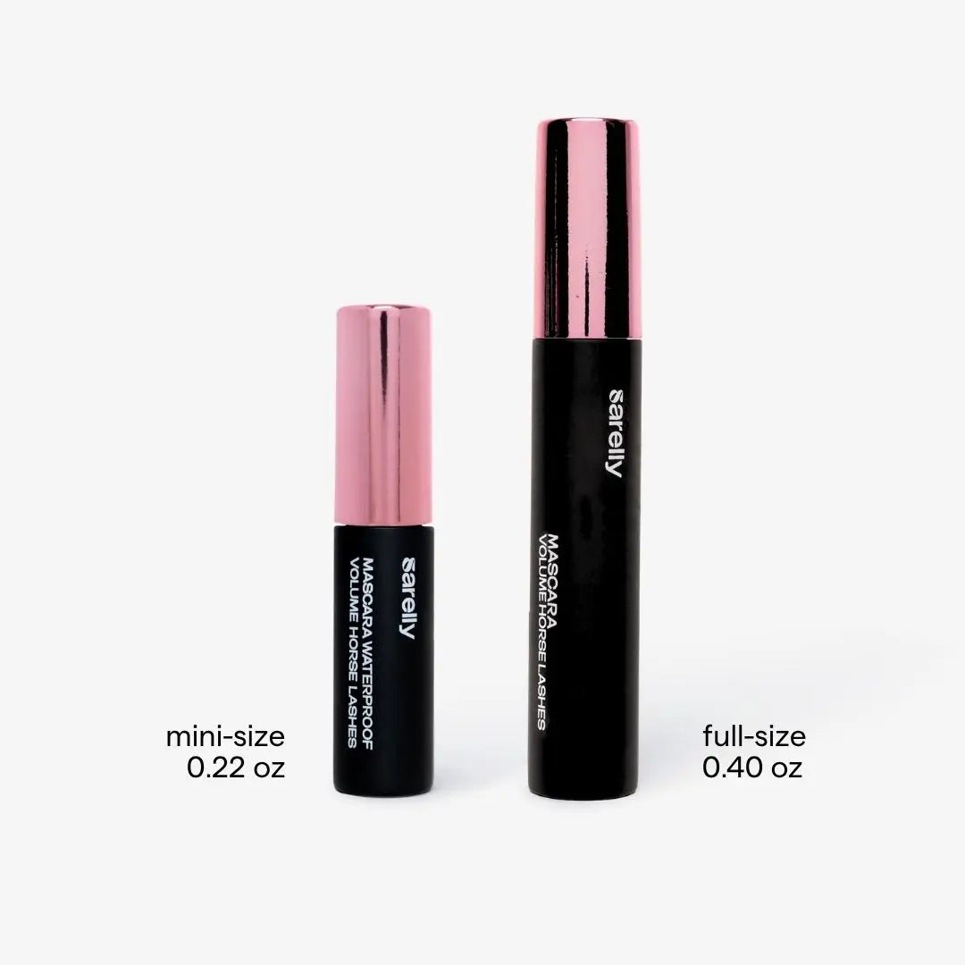 Two black horse lashes mascara tubes on a white background