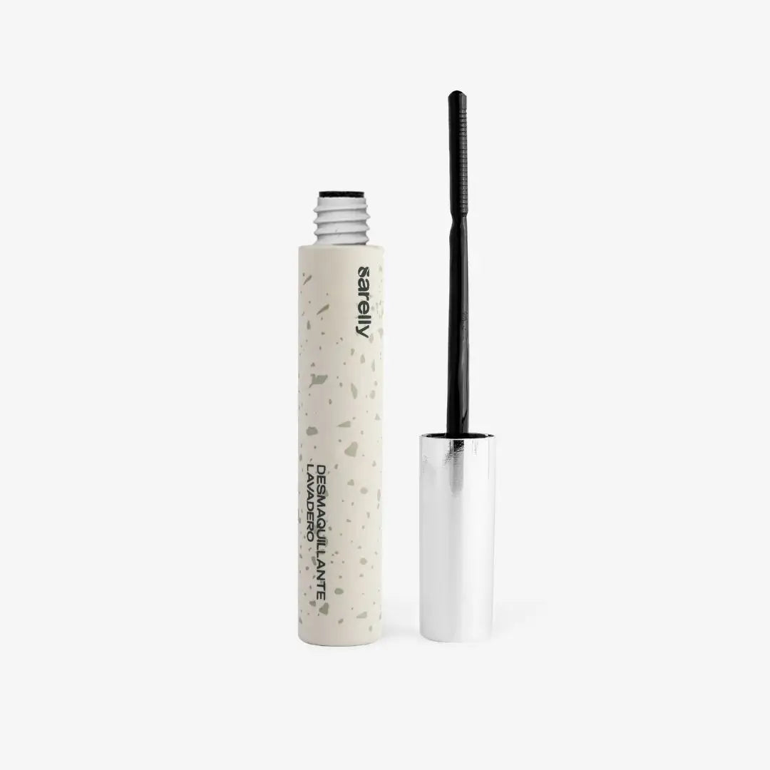 Metallic pen with black cap on a white background of lavadero makeup remover