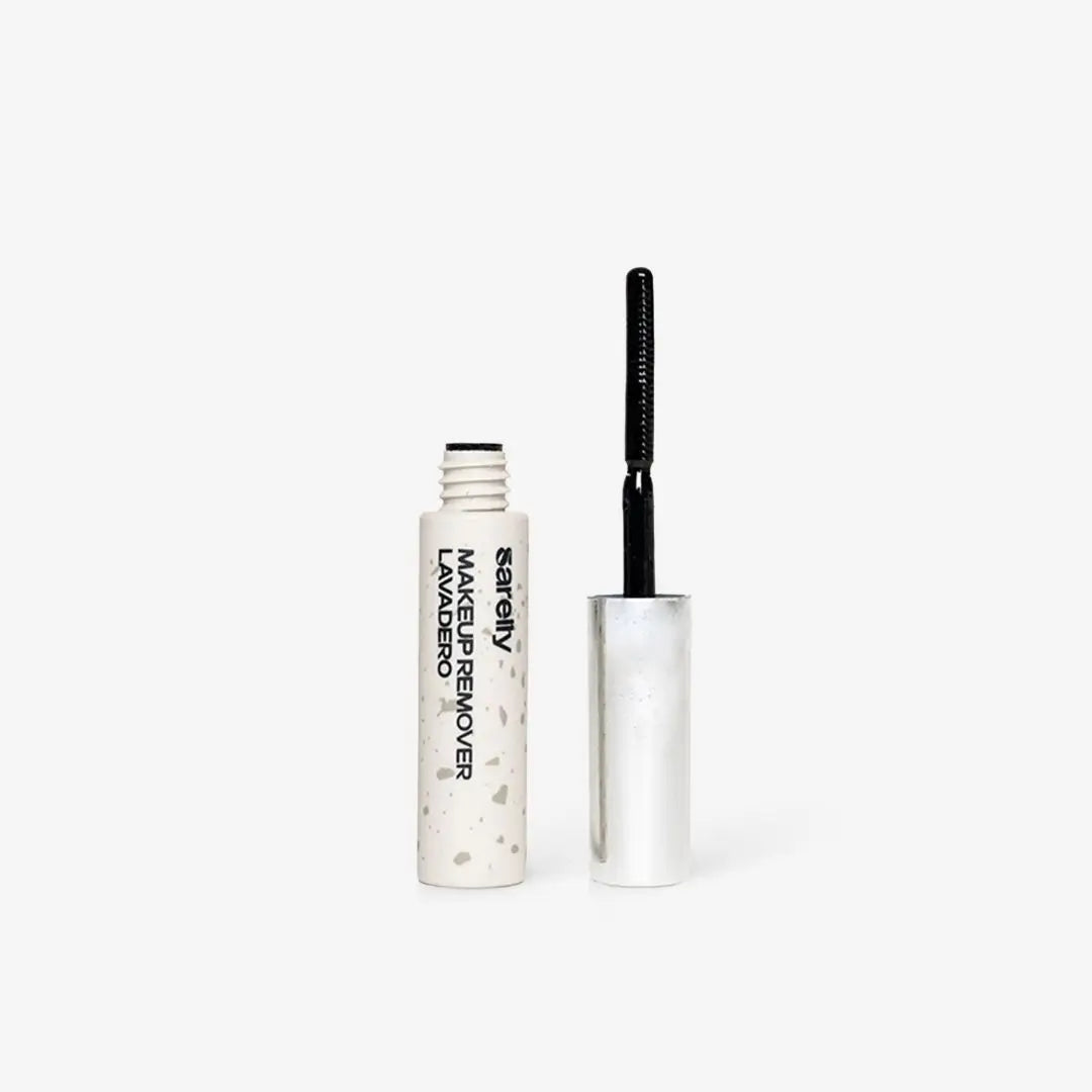 Metallic pen with black cap on a white background of lavadero makeup remover